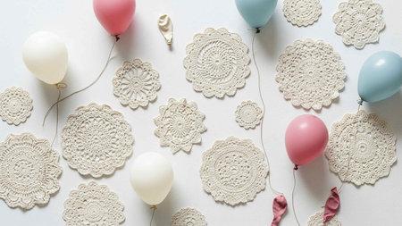 Festive background with white lace and pastel pink and blue balloons