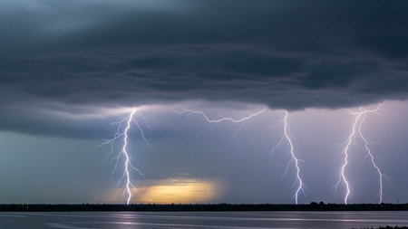 Thunderstorm over the lake with lightning in the evening. Nature background