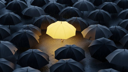 Yellow umbrella among black umbrellas in rain. 3D renderingの写真素材