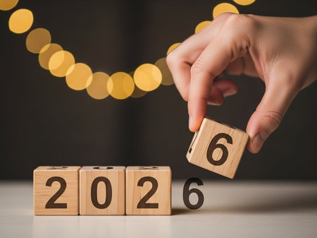 Wooden cubes with numbers 2016 and 2020 on the background of bokehの写真素材