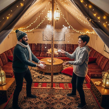 A heartwarming scene of a father and son playing with snow inside a luxurious glamping tent, surrounded by warm lights and comfortable seating.の写真素材