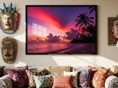 Pillow on the wall with a picture of the sea in the backgroundの写真素材