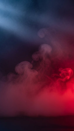 Red and blue smoke on a black background. Abstract background for design.の写真素材