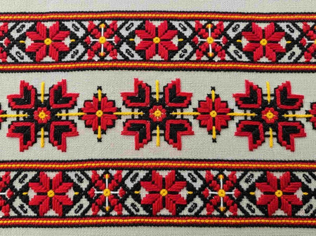 Ukrainian embroidery with bright red and yellow flowers.の写真素材