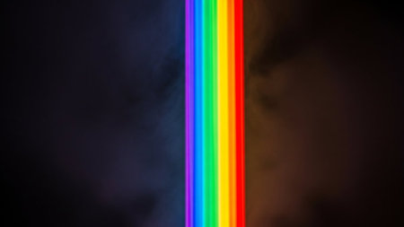 Rainbow colors on a black background. Abstract background for design.の写真素材