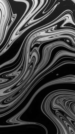 Black and white abstract background. Liquid marble pattern. Monochrome texture.の写真素材