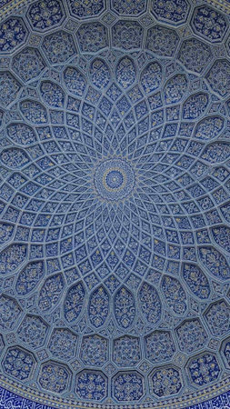 Intricate blue mosaic ceiling with ornate geometric patterns and designsの写真素材