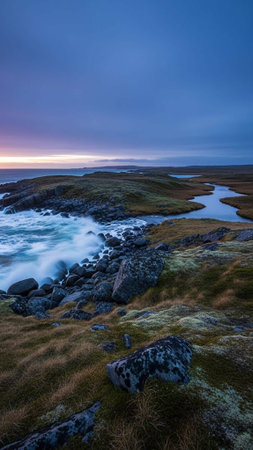A serene landscape of rugged coastline at dusk with turbulent waters