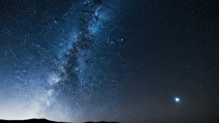 The Milky Way galaxy shines brightly in a clear night sky