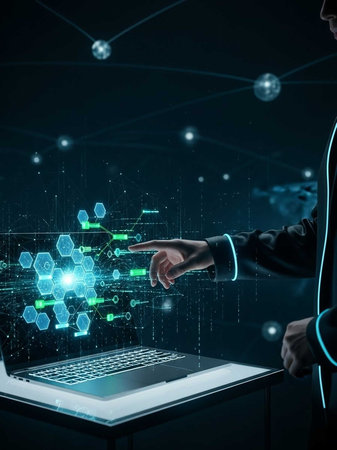 Person pointing at holographic graphics above laptopの写真素材