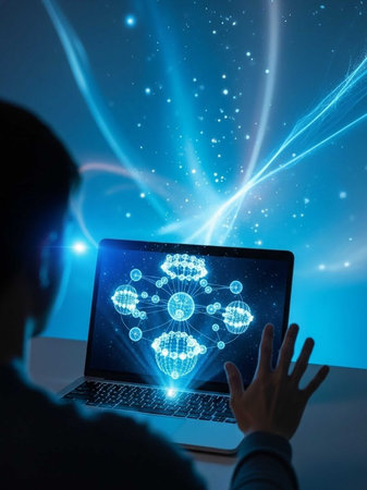Man reaching towards a holographic network on a laptopの写真素材