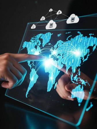 Hands interacting with a digital world map on a touchscreenの写真素材