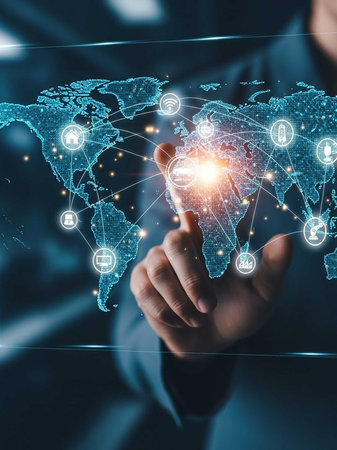 Hand touching holographic world map with icons