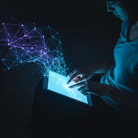 Person interacting with a tablet emitting network graphics