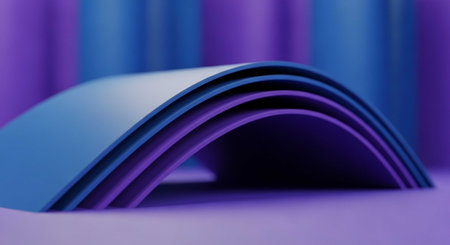 A stack of blue and purple papers curved into an arch shape on a matching backgroundの写真素材