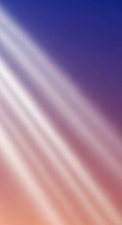 A vibrant and serene sky with rays of sunlight shining throughの写真素材