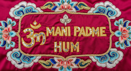 A close-up of an embroidered Tibetan prayer rug with intricate designsの写真素材