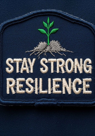 A motivational embroidered patch with a powerful message of resilience and strengthの写真素材