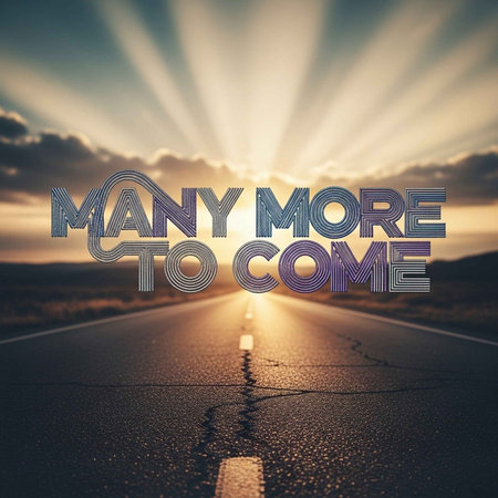 A scenic road stretching into the distance with a bright sunset and inspirational textの写真素材