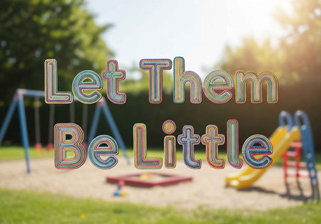 A colorful playground with a quote about childhood innocenceの写真素材