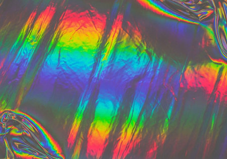A vibrant and colorful abstract background with a rainbow effect