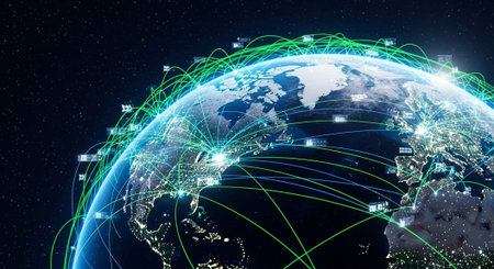 A glowing globe with green lines and lights representing global connections at nightの写真素材