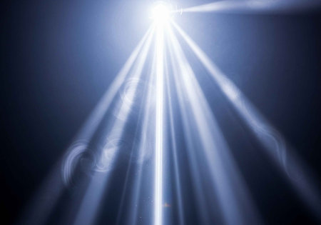 A bright light shining through the darkness with rays of light