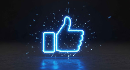 A glowing blue thumbs up icon with sparks on a dark backgroundの写真素材