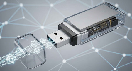 A transparent USB flash drive with a circuit board and binary code streaming out