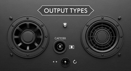 A close-up view of a sound system with various output types and controlsの写真素材