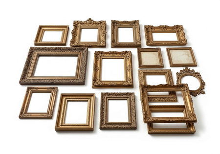 A collection of ornate gold picture frames on a white backgroundの写真素材