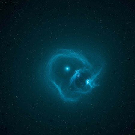 A vibrant blue nebula glows in the dark space with starsの写真素材