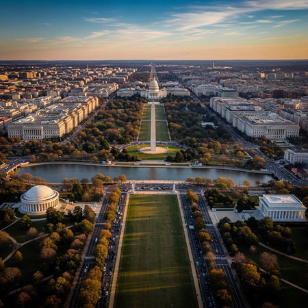 Aerial view of Washington D.C. cityscape with iconic monuments and buildings at sunset