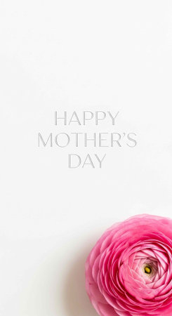 A Happy Mother's Day greeting card with a pink flower on a white backgroundの写真素材