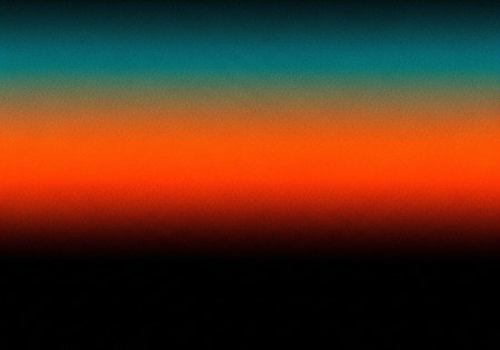 A vibrant and colorful gradient background with shades of orange and blueの写真素材