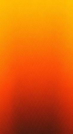 A vibrant and colorful gradient background with warm orange and yellow huesの写真素材