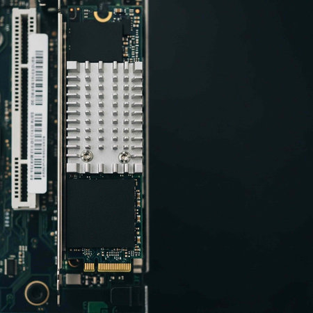 A close-up view of a computer circuit board with various componentsの写真素材