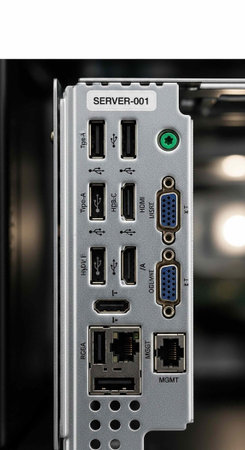 A close-up view of a server's back panel with various ports and connectors