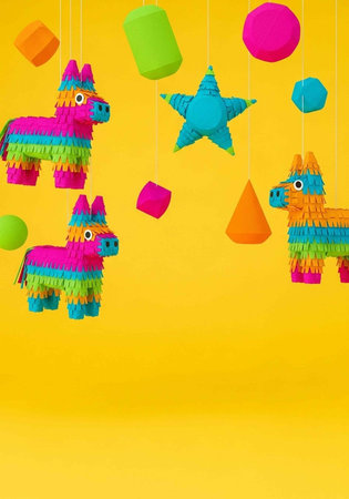 Vibrant pinatas and geometric shapes suspended against a sunny yellow backdrop
