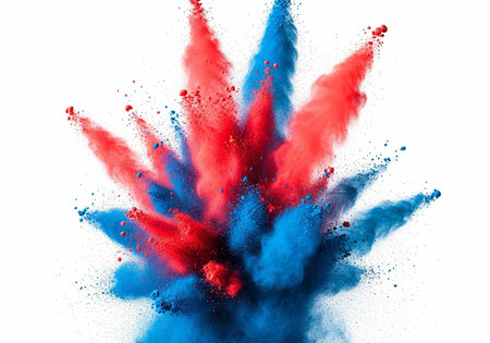 Colorful red and blue powder explodes in a dynamic, abstract pattern against a clean white backdrop.