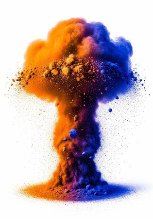 Colorful powder explodes in a mushroom-shaped cloud of orange and blue hues.