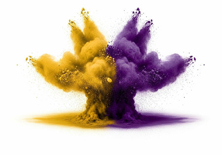 Colorful yellow and purple powder explodes in mid-air, creating a dynamic cloud of particles