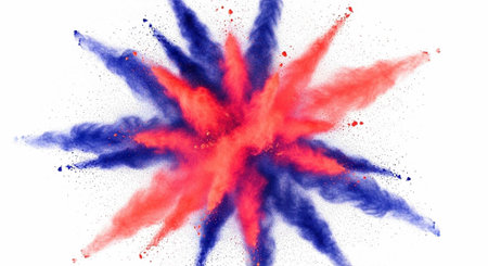 A vibrant red and blue powder explosion on a white background