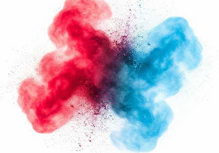 A vibrant cloud of red and blue powder explodes in a dynamic artistic display on a white background