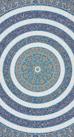 A stunning blue and white circular pattern with intricate design and symmetry
