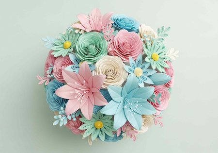 A beautiful bouquet of colorful paper flowers on a light backgroundの写真素材