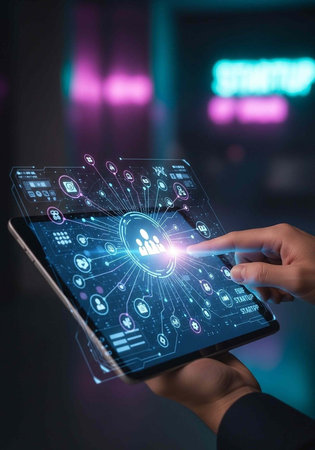 A person interacts with a futuristic tablet displaying various digital icons and data in a dark room