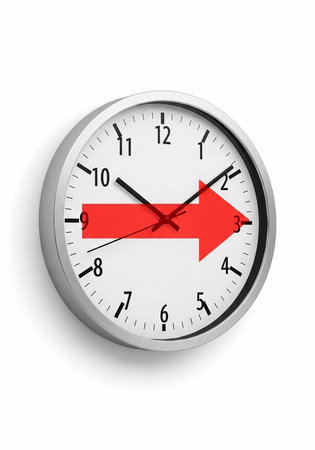 A clock with a red arrow pointing to the right on its face, indicating time moving forward.