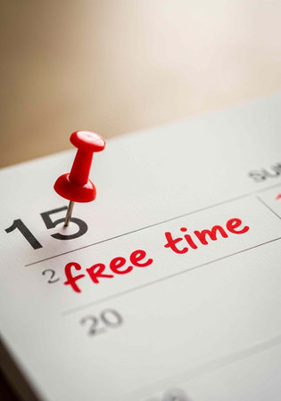 A calendar page with a red push pin marking a free time slot on the 15th
