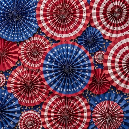 A vibrant display of red, white, and blue paper fans with star patterns for a festive celebration